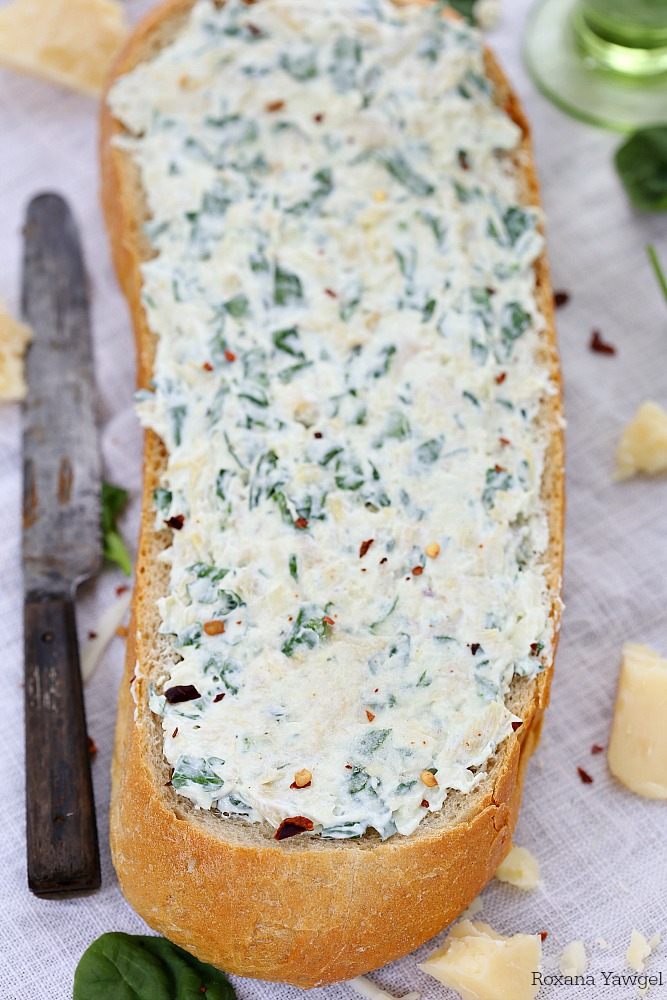 Three types of cheese and a dollop of yogurt make this spinach artichoke dip stuffed bread incredibly creamy and cheesy. It is a guaranteed hit with the crowd and always disappears – no leftovers in sight!