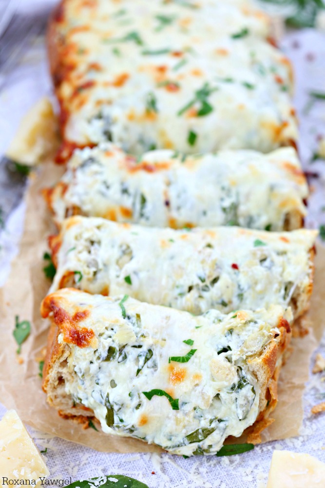 Three types of cheese and a dollop of yogurt make this spinach artichoke dip stuffed bread incredibly creamy and cheesy. It is a guaranteed hit with the crowd and always disappears – no leftovers in sight!