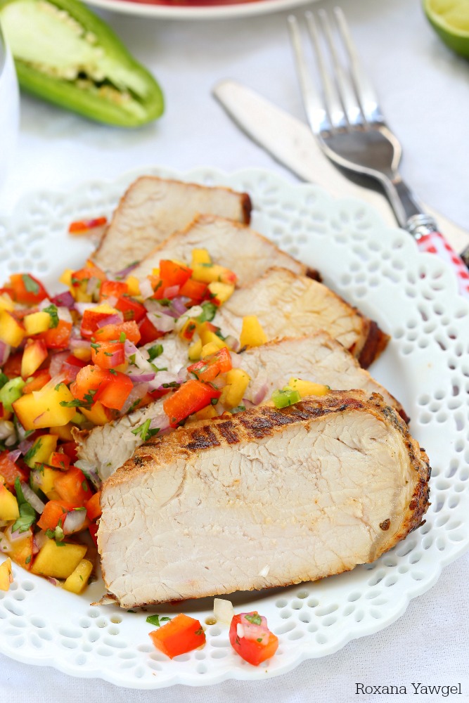 Grilled garlic and herb pork loin with peach salsa is an effortless dinner meal for all those busy weeknights. With only 10 minutes of prep time, you'll be making this over and over again! 