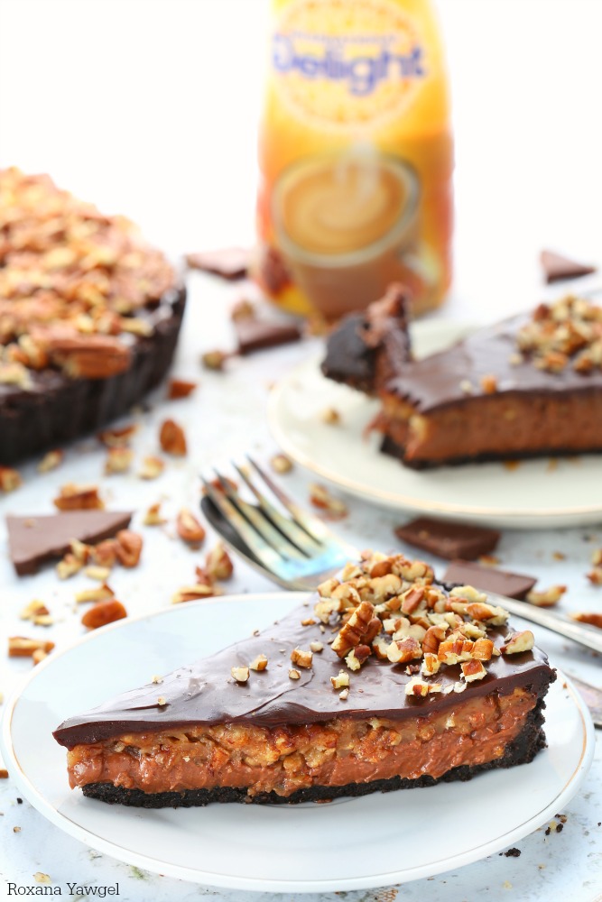A twist on the classic Thanksgiving dessert, this no bake chocolate pecan pie features three layers of chocolate goodness and a very generous amount of pecan pie filling. Everyone will rave about it! 