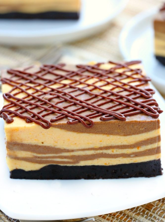 A cheesecake that crossed paths with a pumpkin pie, these marble no bake chocolate pumpkin cheesecake bars feature layers of creamy pumpkin and rich chocolate all infused with just the right amount of pumpkin spice!