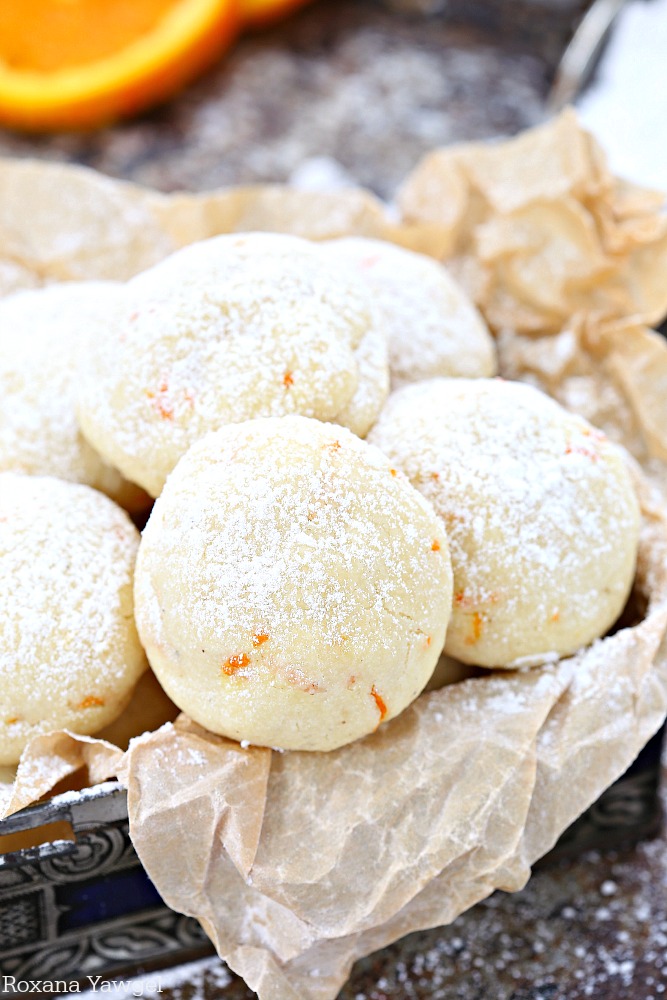 One secret ingredient makes these orange vanilla cookies simply melt in your mouth! Packed with freshly grated orange zest and vanilla bean paste, these orange vanilla cookies are the perfect addition to your cookie tray! 