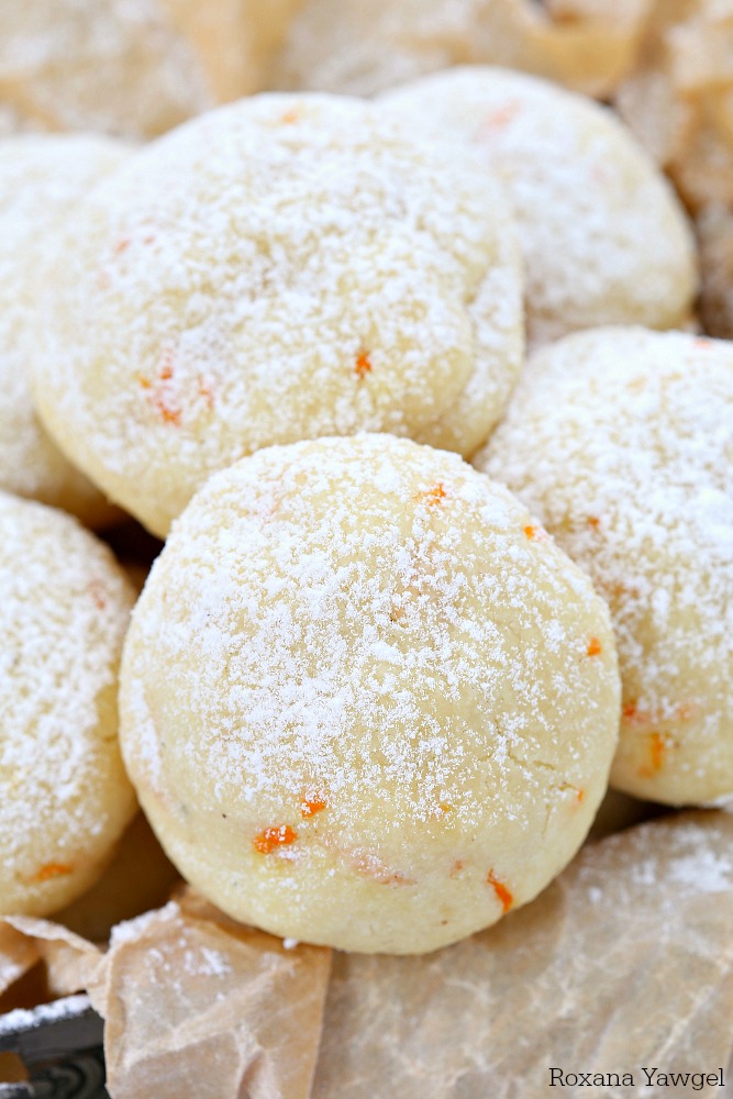 One secret ingredient makes these orange vanilla cookies simply melt in your mouth! Packed with freshly grated orange zest and vanilla bean paste, these orange vanilla cookies are the perfect addition to your cookie tray! 