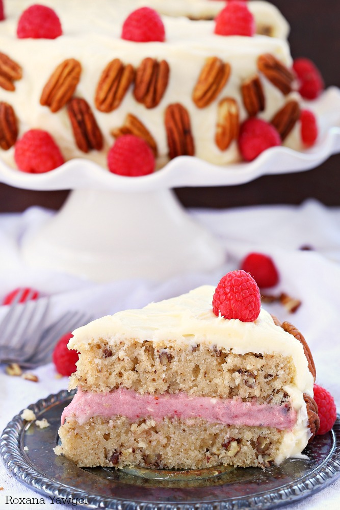 Incredibly moist, tender and delicious this white chocolate pecan cake has a subtle white chocolate flavor and crunchy pecans in every bite. The raspberry white chocolate frosting is rich, creamy and delicious. One bite and you can't stop!
