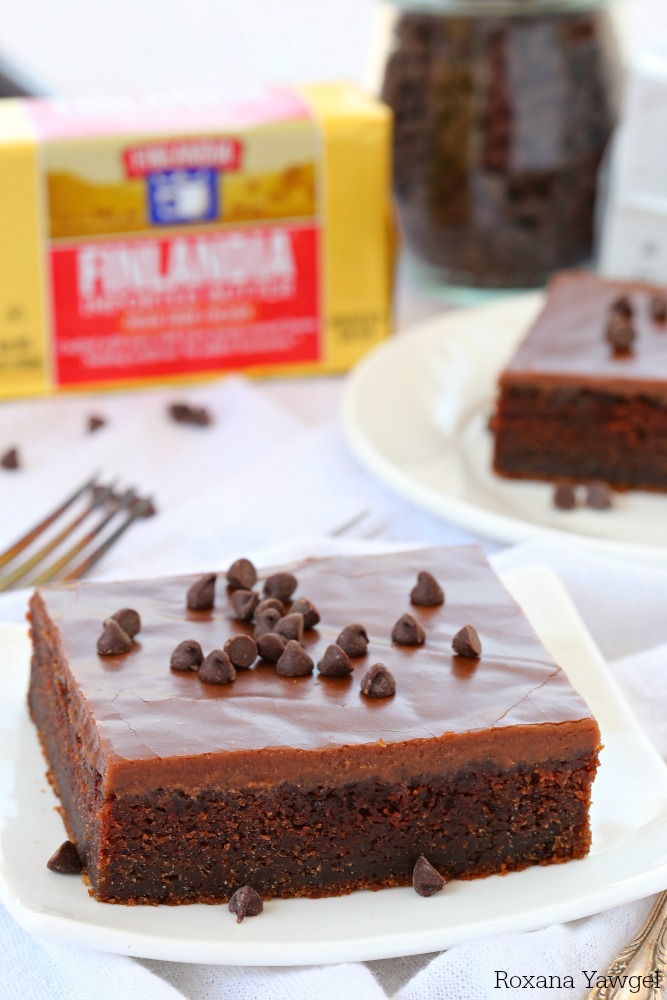 Enjoy this irresistibly rich and creamy chocolate cake topped with a delicious fudgy warm chocolate frosting. 