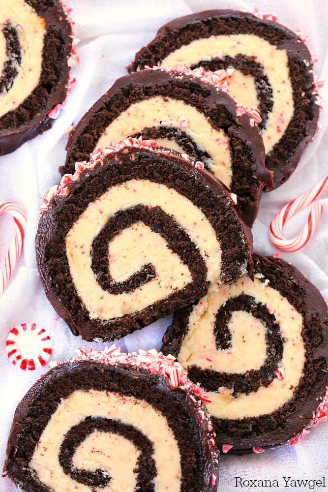 A delicious chocolate cake filled with an irresistible peppermint white chocolate filling, this chocolate peppermint bark roll cake is perfect for the Christmas holiday! Don't be intimidated by its festive swirl, follow my tips for a successful roll cake every time!