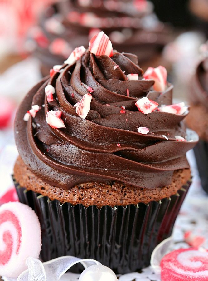 Easy to make rich chocolate peppermint cupcakes topped with a fudgy peppermint frosting are a fun and festive holiday dessert!