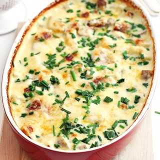 Potatoes au gratin loaded with cheese, cream and garlic. An easy no fuss no mess delicious weeknight meal. (and the perfect side dish to your holiday meal)