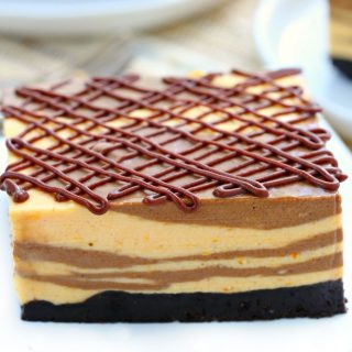 A cheesecake that crossed paths with a pumpkin pie, these marble no bake chocolate pumpkin cheesecake bars feature layers of creamy pumpkin and rich chocolate all infused with just the right amount of pumpkin spice!