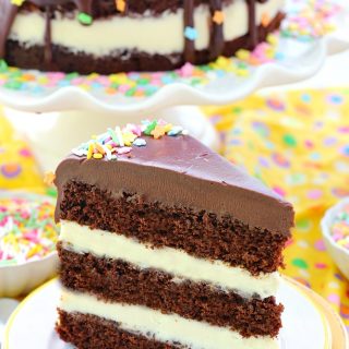 With a perfectly light and tender cake crumb, this delicious made from scratch chocolate cake is finished with a scrumptious vanilla cream cheese frosting. You’ll find every excuse to make this chocolate cake with vanilla cream cheese frosting over and over again!